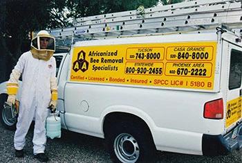 Pima County bee removal service truck and employee